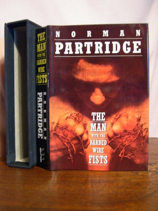 Item #50486 THE MAN WITH THE BARBED WIRE FISTS. Norman Partridge