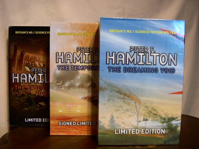 Item #33074 THE VOID TRILOGY. THE DREAMING VOID, THE TEMPORAL VOID, and THE EVOLUTIONARY VOID. Peter F. Hamilton.