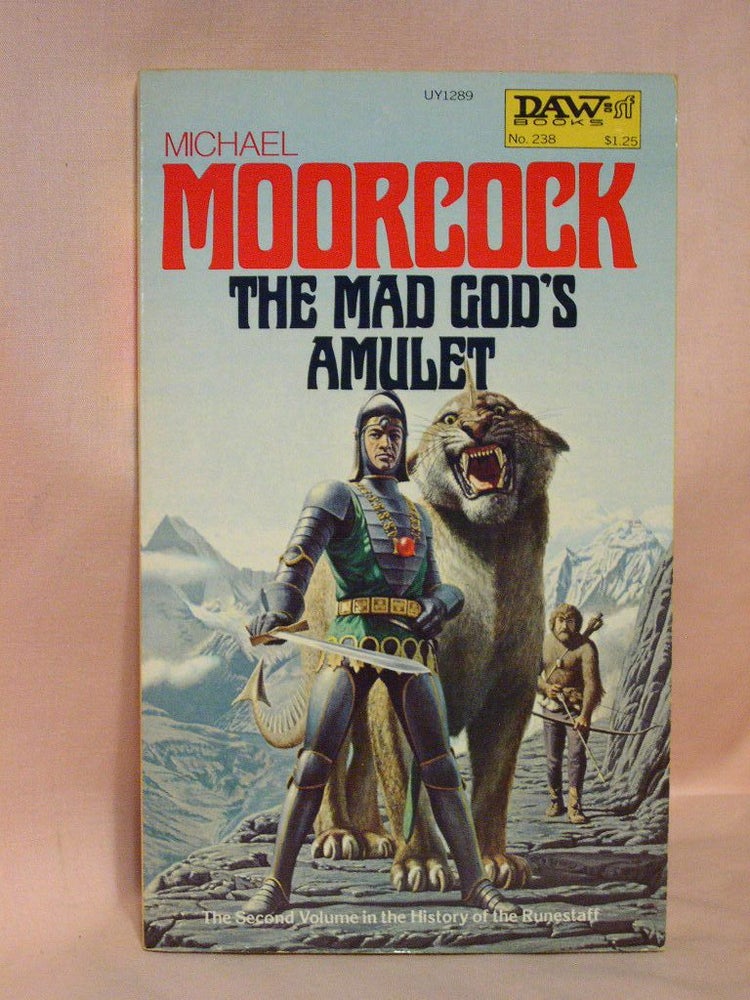 Item #37215 THE MAD GOD'S AMULET; VOLUME TWO IN THE HISTORY OF THE RUNESTAFF. Michael Moorcock.