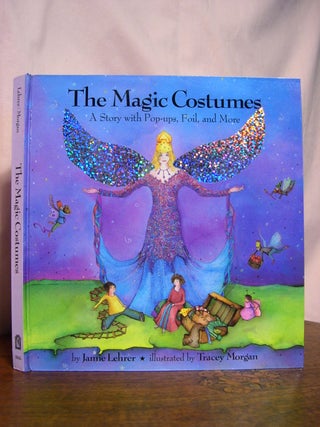 Item #49492 THE MAGIC COSTUMES: A STORY WITH POP-UPS, FOIL, AND MORE. Jamie Lehrer
